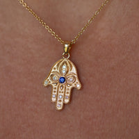 Floral Hamsa Necklace with Blue Sapphire & Diamonds | Symbolic Jewelry