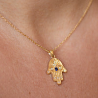 Floral Hamsa Necklace with Blue Sapphire & Diamonds | Symbolic Jewelry