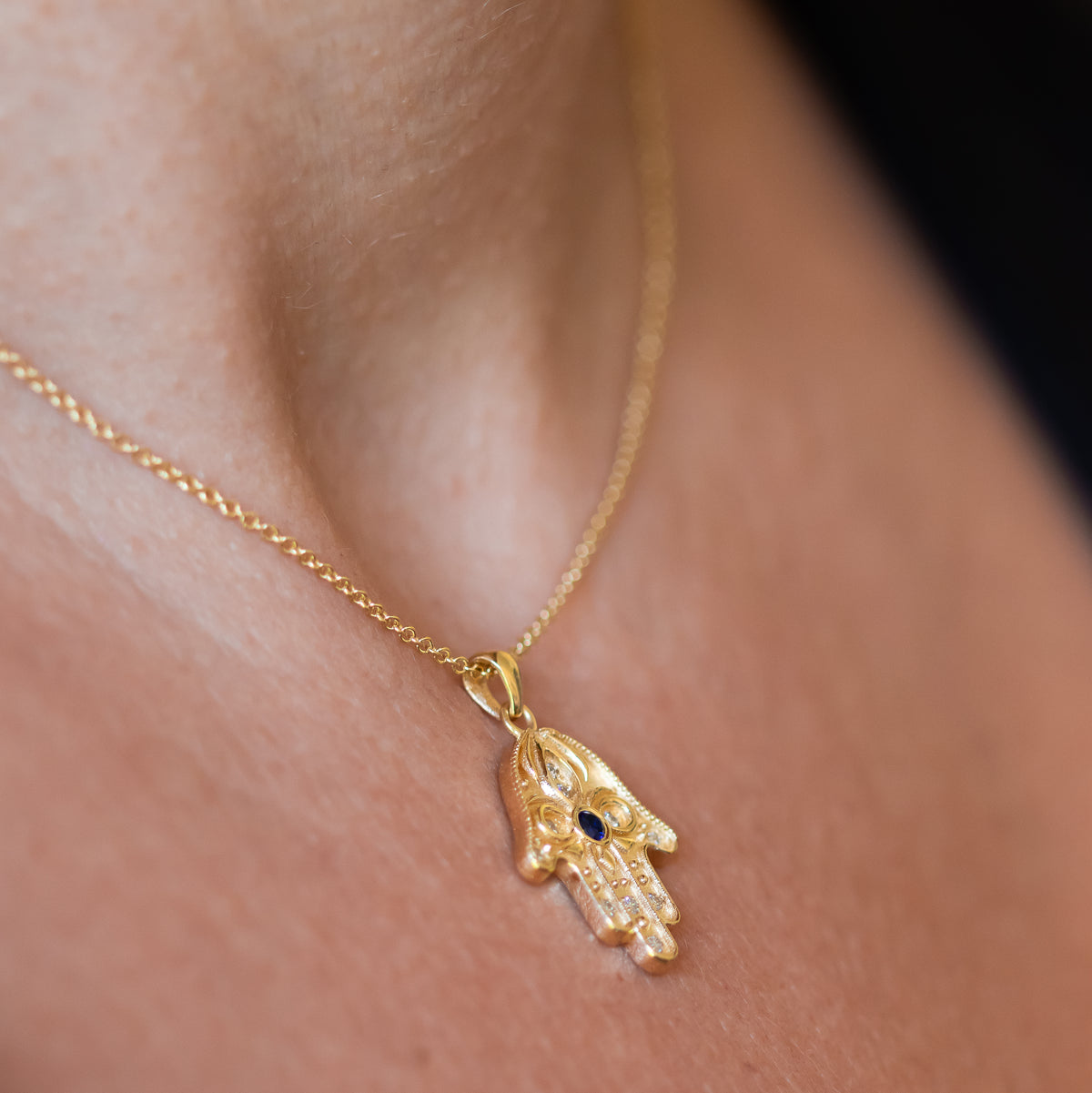 Floral Hamsa Necklace with Blue Sapphire & Diamonds | Symbolic Jewelry