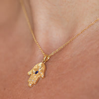 Floral Hamsa Necklace with Blue Sapphire & Diamonds | Symbolic Jewelry