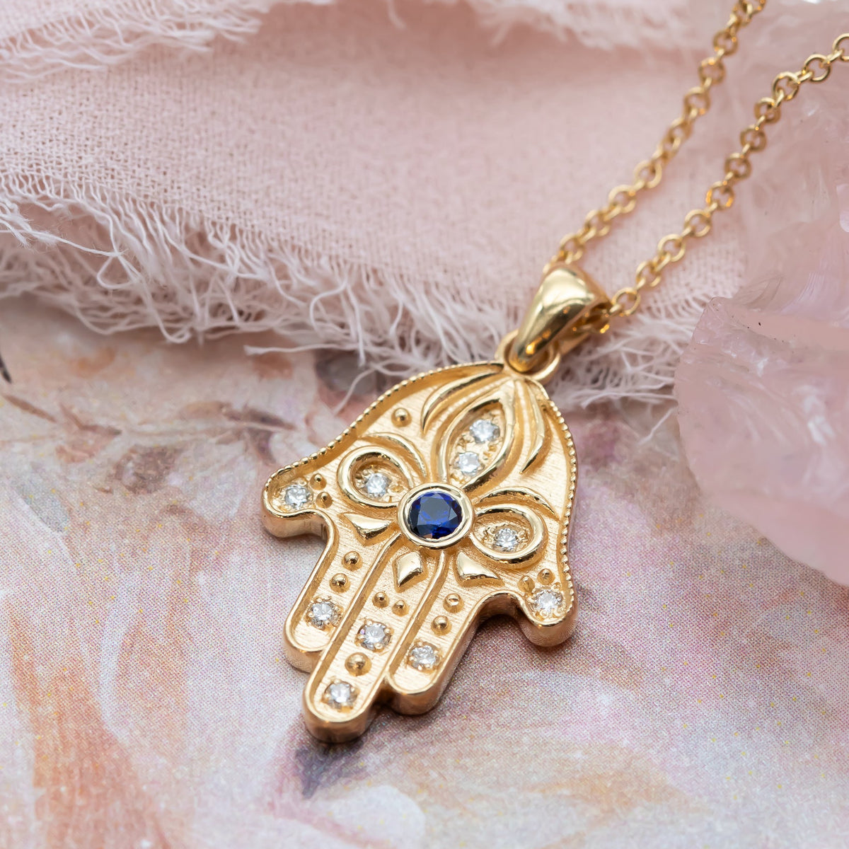 Floral Hamsa Necklace with Blue Sapphire & Diamonds | Symbolic Jewelry