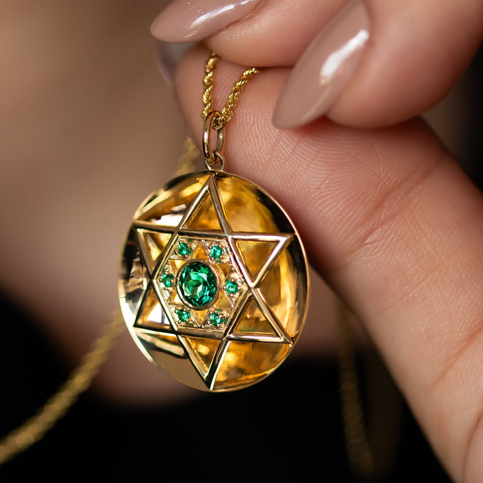 Jewish heritage pendant – gold disc with emerald Star of David design