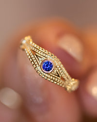 Evil Eye Ring with Diamonds and Blue Sapphire