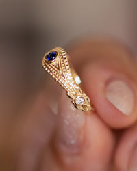 Evil Eye Ring with Diamonds and Blue Sapphire