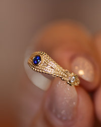 Evil Eye Ring with Diamonds and Blue Sapphire