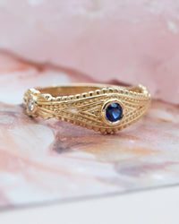 Evil Eye Ring with Diamonds and Blue Sapphire