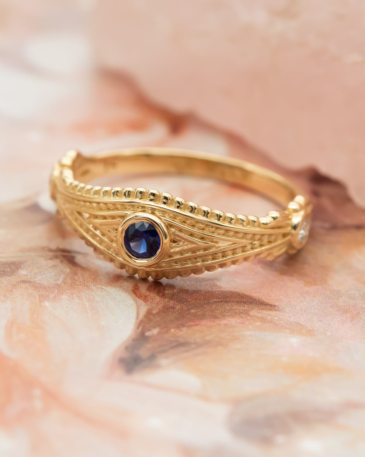 Evil Eye Ring with Diamonds and Blue Sapphire