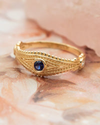 Evil Eye Ring with Diamonds and Blue Sapphire