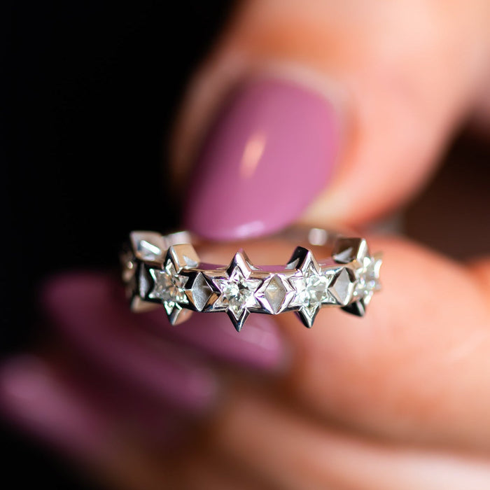 White gold Star of David ring with diamonds, held in hand – a meaningful piece from the Heritage Collection by Sivan Lotan, symbolizing strength, identity, and resilience.