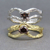 Nature-inspired twig gold ring with a heart-shaped brown diamond and a matching band