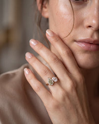 elara-green-engagement-ring-on-hand