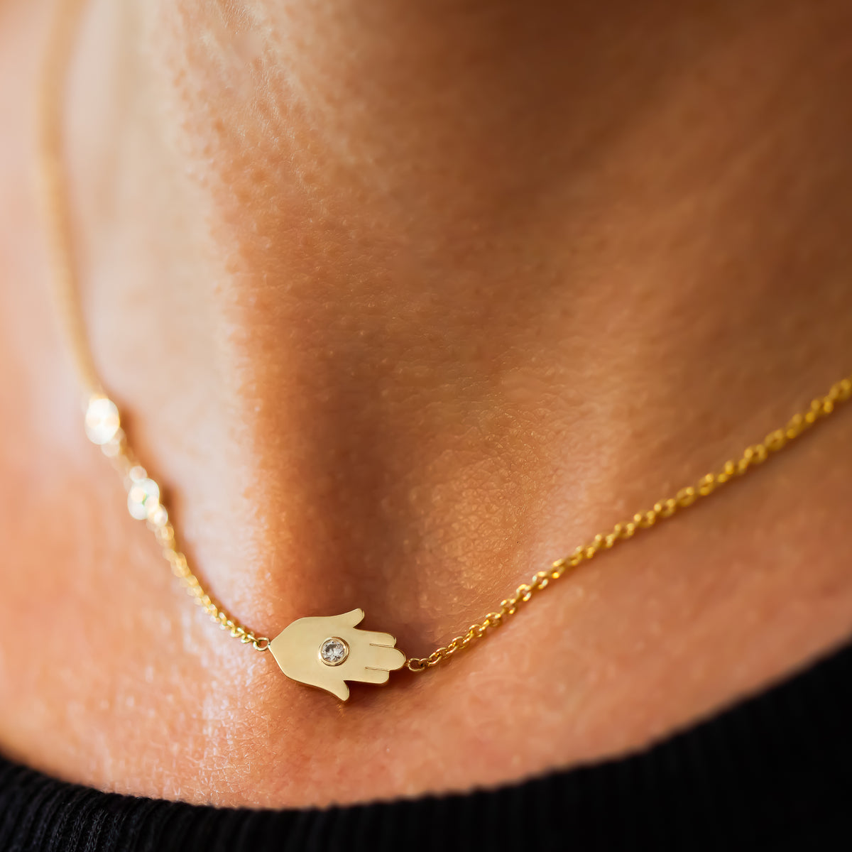 Sideways Hamsa Necklace with Diamonds and Sapphire