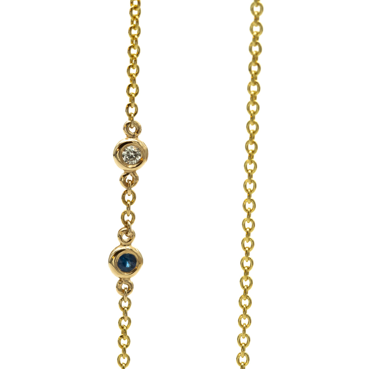 Sideways Hamsa Necklace with Diamonds and Sapphire