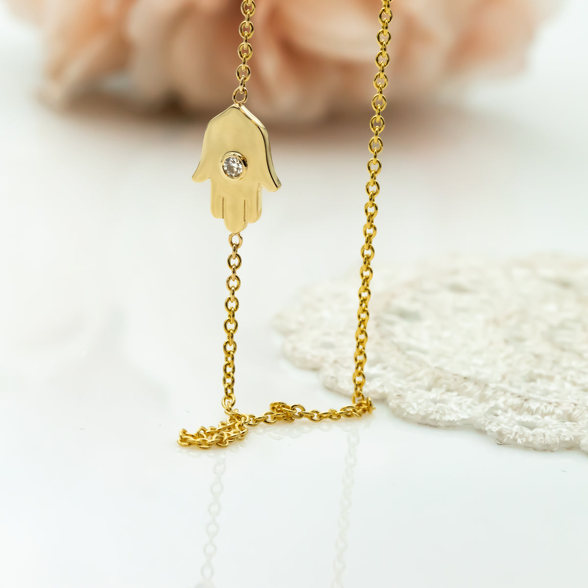Sideways Hamsa Necklace with Diamonds and Sapphire