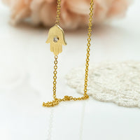 Sideways Hamsa Necklace with Diamonds and Sapphire