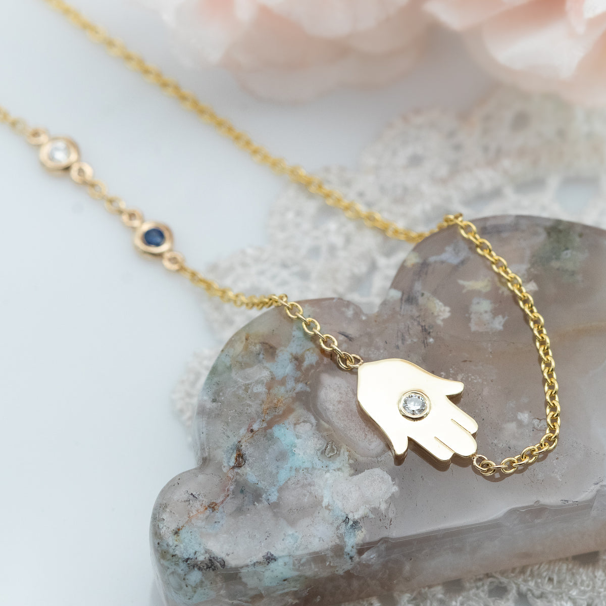 Sideways Hamsa Necklace with Diamonds and Sapphire