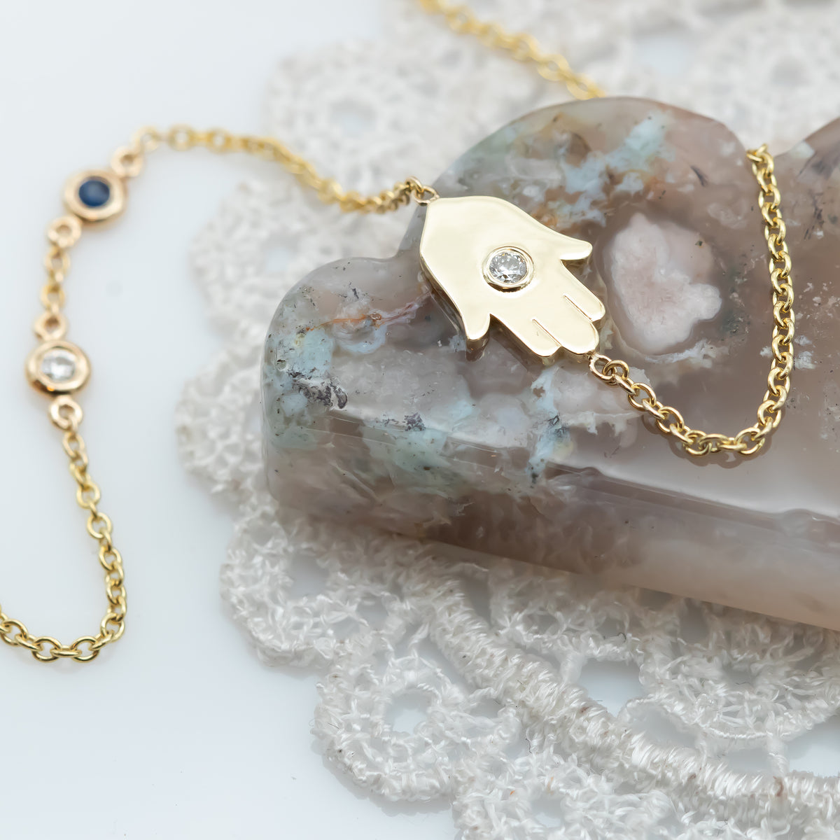 Sideways Hamsa Necklace with Diamonds and Sapphire