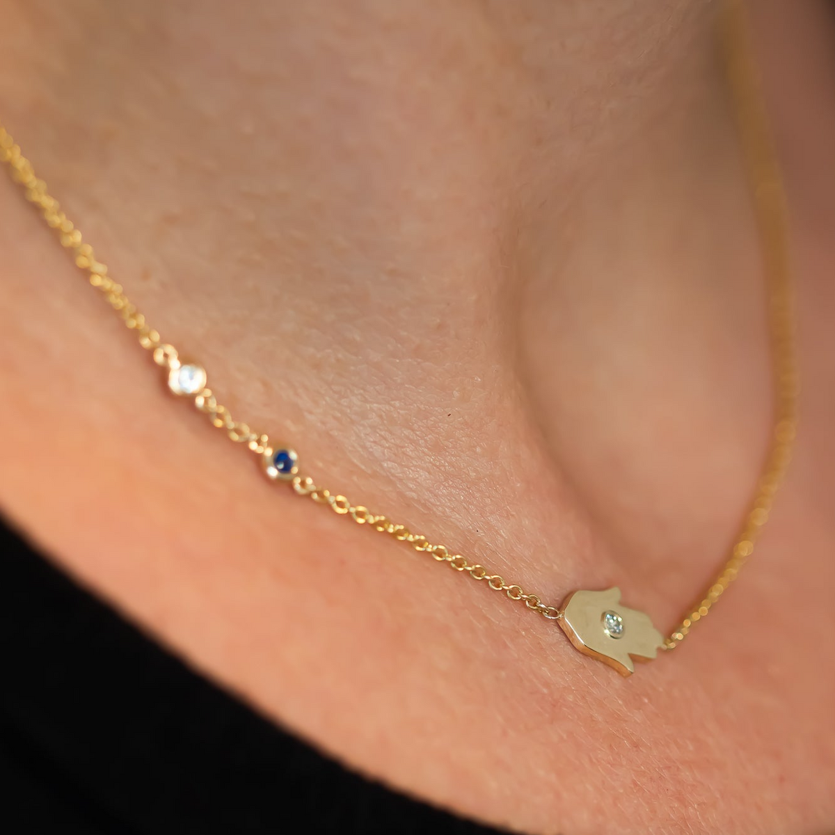 Sideways Hamsa Necklace with Diamonds and Sapphire