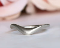 Asymmetric Curved Wave Ring