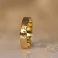 Hammered gold wedding band for men in 14k gold