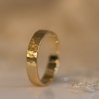 Hammered gold wedding band for men in 14k gold