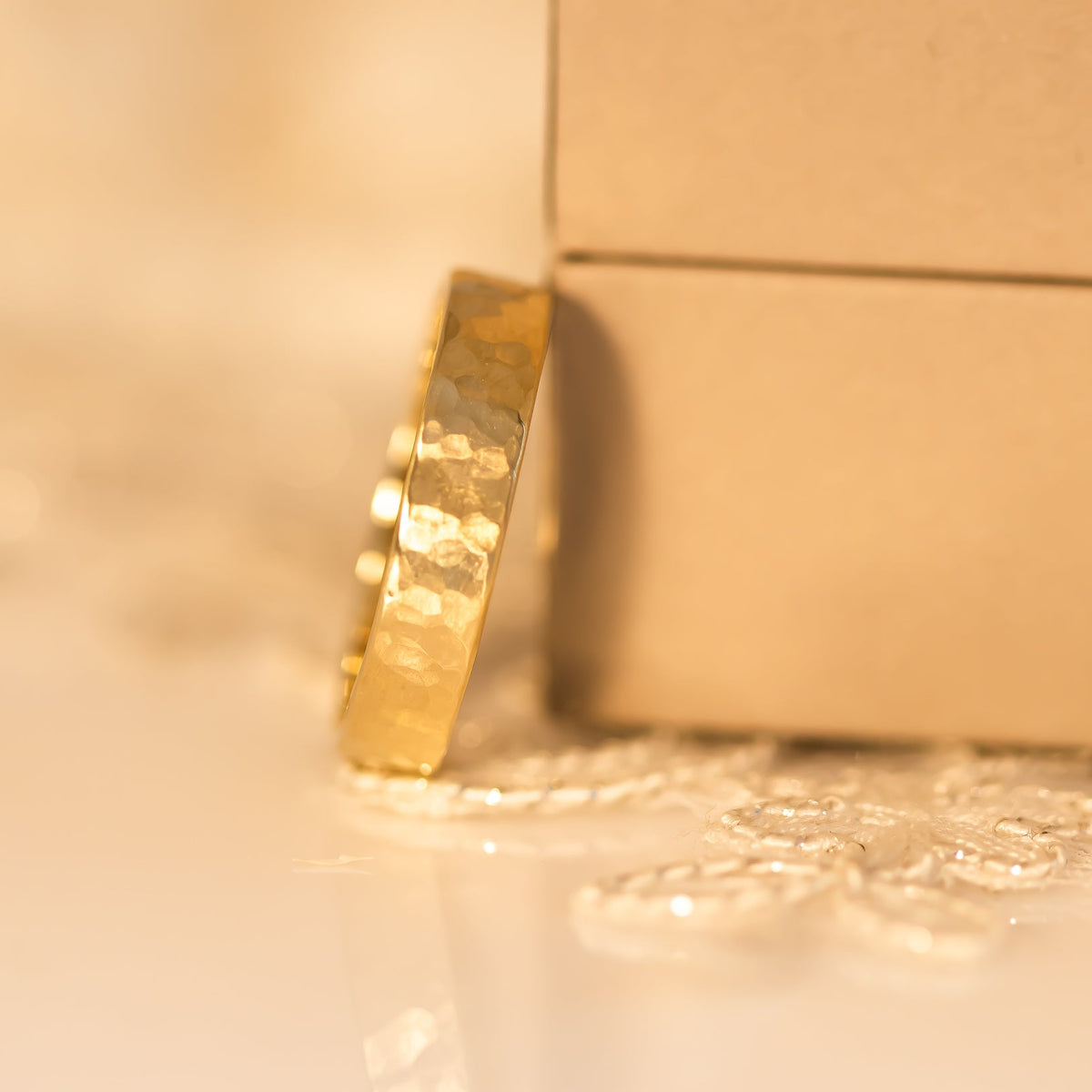 Hammered gold wedding band for men in 14k gold
