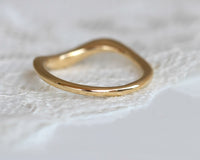 Asymmetrical curved Wedding Band