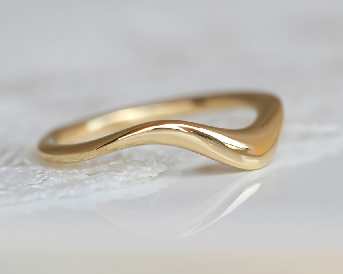 Asymmetrical curved Wedding Band
