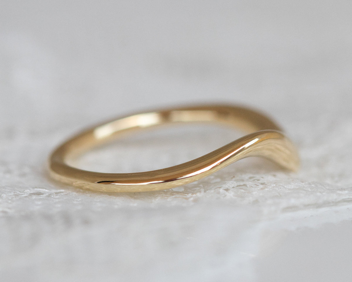 Asymmetrical curved Wedding Band