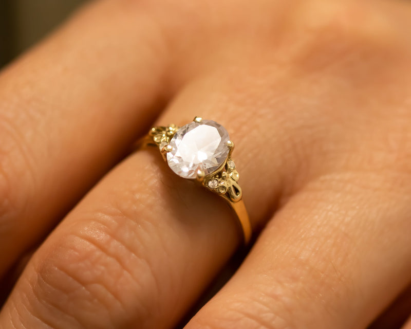 Oval Moissanite and Diamonds Ring